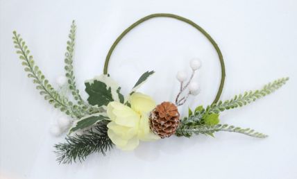 22081 -  Beautiful Cream flower in a wintery wreath with a display of snowy pine needles, cones, berries and green leaves. Floral decoration. Size   Approx 24cm dia