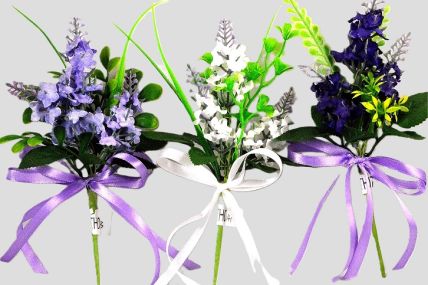 33002 - Floral arrangement with delicate flowers and leaves embellished with a satin bow. Floral Pick. Height  20cms ,  Width  11cms  (approx) 