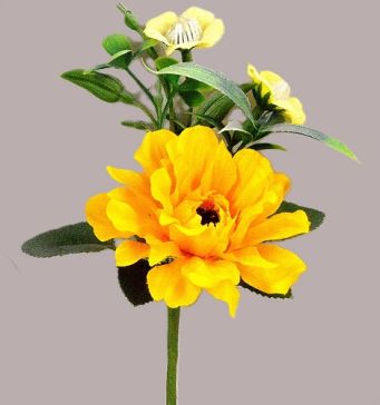 33009 - Bright Yellow floral arrangement accompanied with delicate Primrose flowers and leaves. Floral Pick. Height  17cms ,  Width  12cms   (approx)