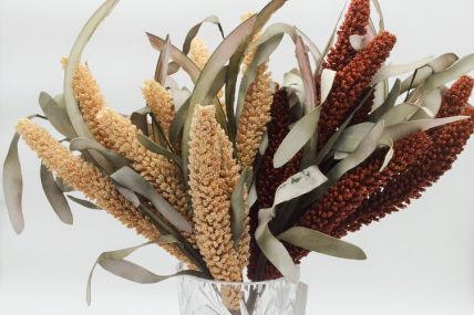33029 - Floral display with soft textures of leaves and grasses.  Height  52cms ,  Width 21cms  (approx) 