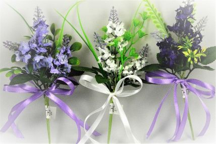 33002 - Floral arrangement with delicate flowers and leaves embellished with a satin bow. Floral Pick. Height  20cms ,  Width  11cms  (approx) 
