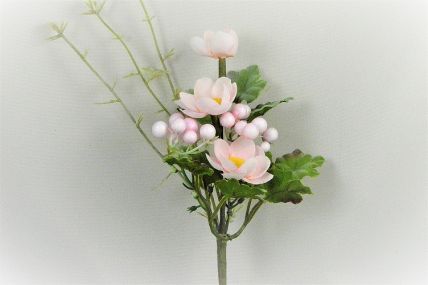33007 - Spring floral arrangement.  Delicate pink petals surround a bright Yellow centre. Floral Pick.  Height  21cms ,  Width  9cms  (approx )