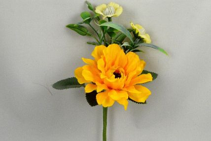 33009 - Bright Yellow floral arrangement accompanied with delicate Primrose flowers and leaves. Floral Pick
