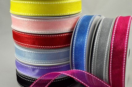 55123 - 16mm sheer ribbon with a white saddle  stitch x 20mts