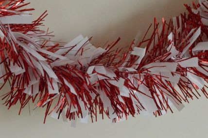 88134 - Red Tinsel with Hanging White Deco x 2 Metre Lengths!